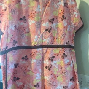 Cute scrub shirt is in great condition